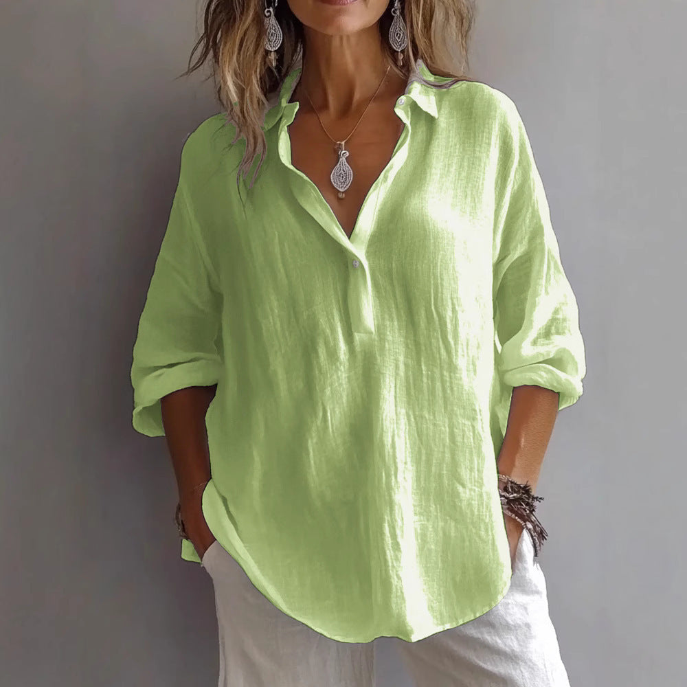 Women's loose-fitting pullover shirt in vibrant lime green, featuring a lapel collar and 3/4 sleeves.
